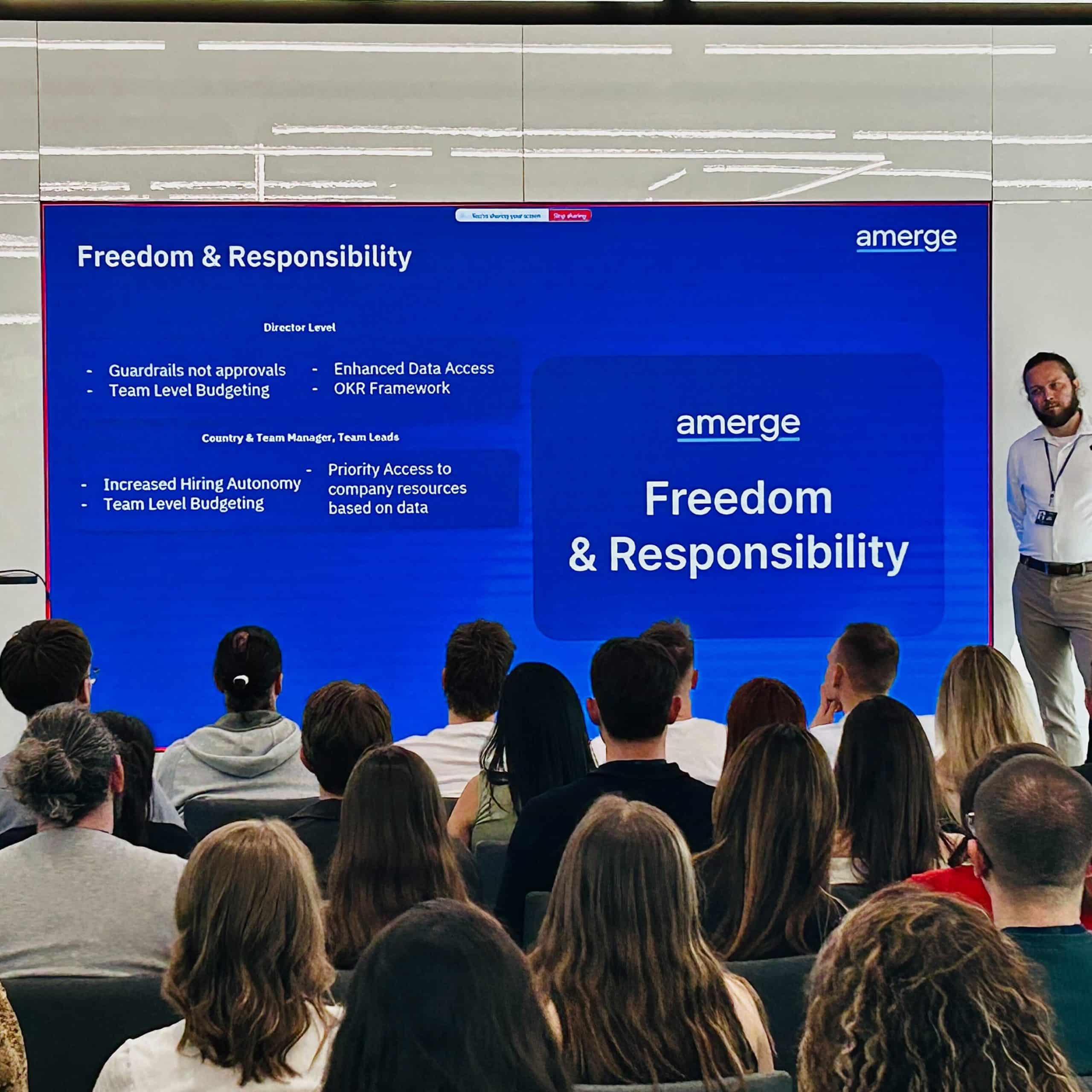 Three Amerge founders presenting a new company value at the 2025 Amerge Global Summit, highlighting leadership, innovation, and shared vision. Three Amerge founders presenting a new company value at the 2025 Amerge Global Summit, highlighting leadership, innovation, and shared vision.